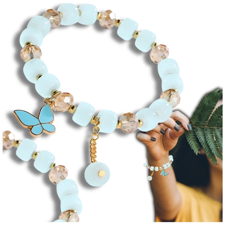 Bratara de dama albastra cu margele cu pandantiv fluture pe o banda elastica