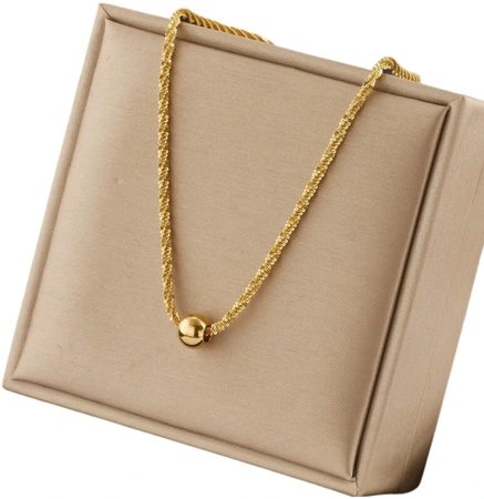 Colier delicat de aur cu o bilă de oțel chirurgical