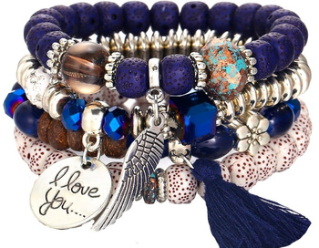 Brățară cu perle, mărgele și brelocuri cu pompon cu aripi