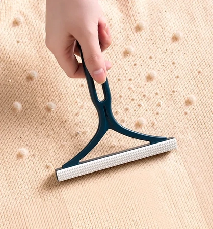 Aparat de ras manual pentru pulovere, haine, perie