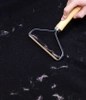 Aparat de ras manual pentru pulovere, haine, canapele