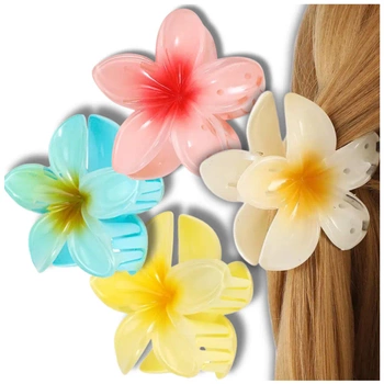 Un set de 3 bucăți de agrafe de păr cu flori de plumeria colorate