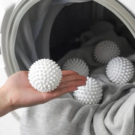 Set de 4 bile de curatat haine pentru indepartarea petelor din balsamvul masinii de spalat rufe