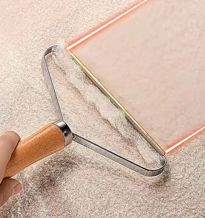 Aparat de ras manual pentru pulovere, haine, canapele