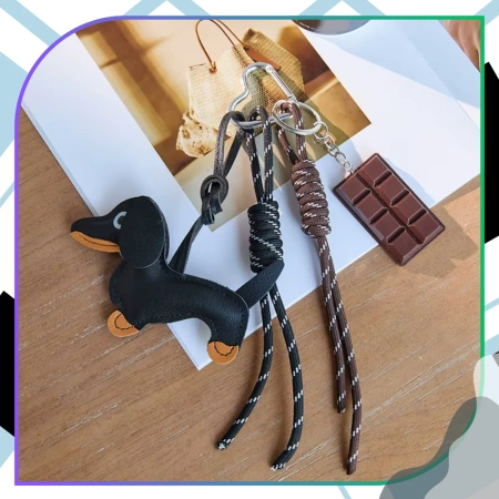 Breloc pentru o pungă de chei, breloc, pandantiv, teckel, tabletă de ciocolată