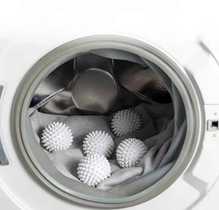 Set de 4 bile de curatat haine pentru indepartarea petelor din balsamvul masinii de spalat rufe