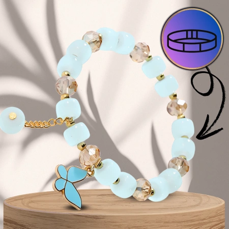 Bratara de dama albastra cu margele cu pandantiv fluture pe o banda elastica